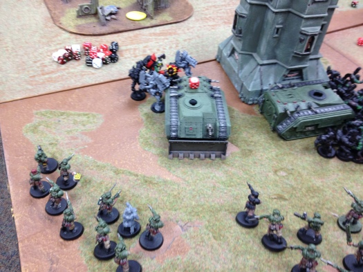 The melta-veterans of 3rd Platoon gun down the Stormboy Nob, and cause them to break.  They run off the table.